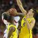 Michigan freshman Mitch McGary attempts to block Louisville sophomore Chane Behanan during the second half of the national championship game at the Georgia Dome in Atlanta on Monday, April 8, 2013. Melanie Maxwell I AnnArbor.com